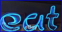 EAT neon sign, vintage from Route 66 diner. 1950's cafe or restaurant
