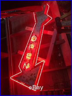 Vintage neon arrow open sign